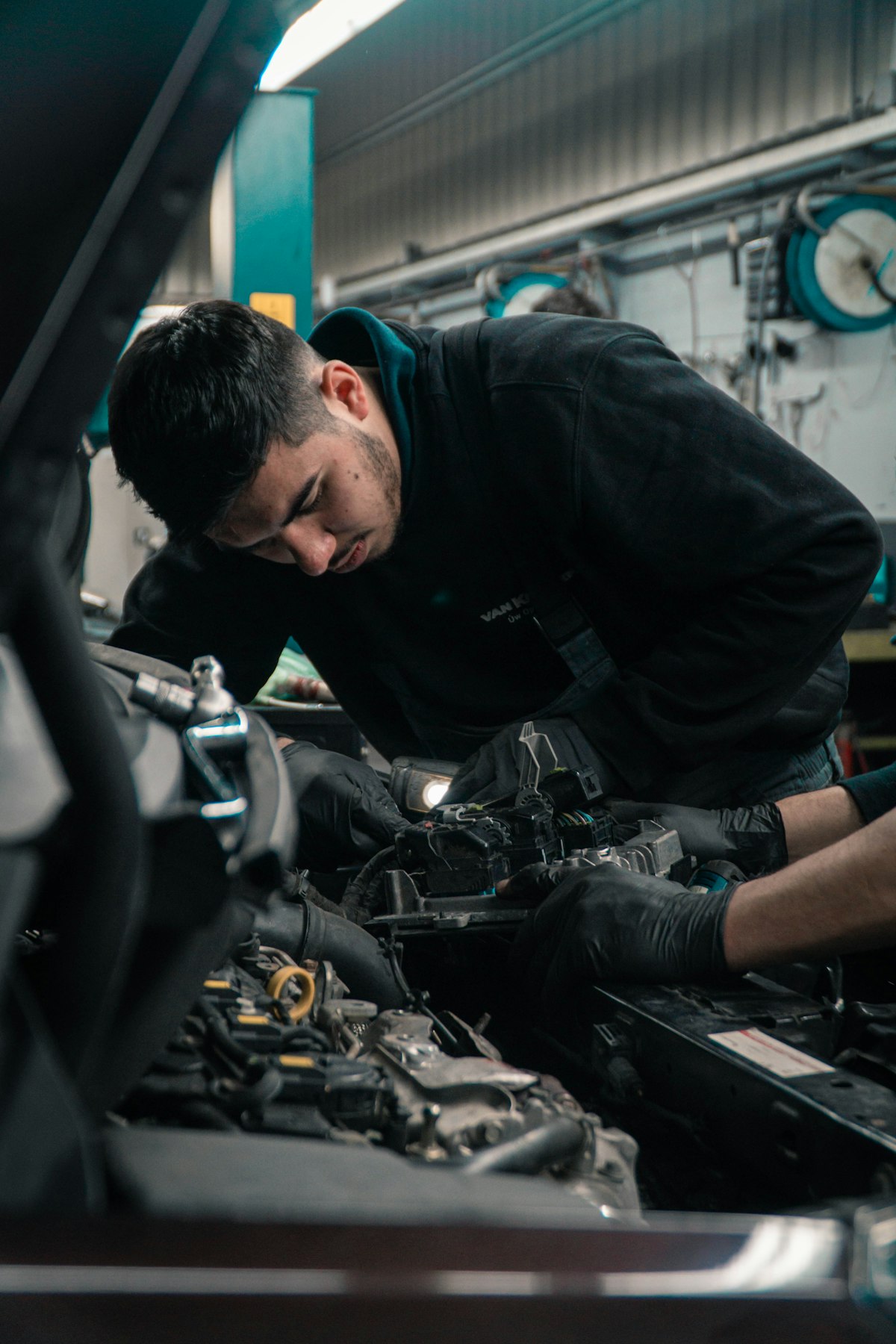 Mechanic working in the engine bay